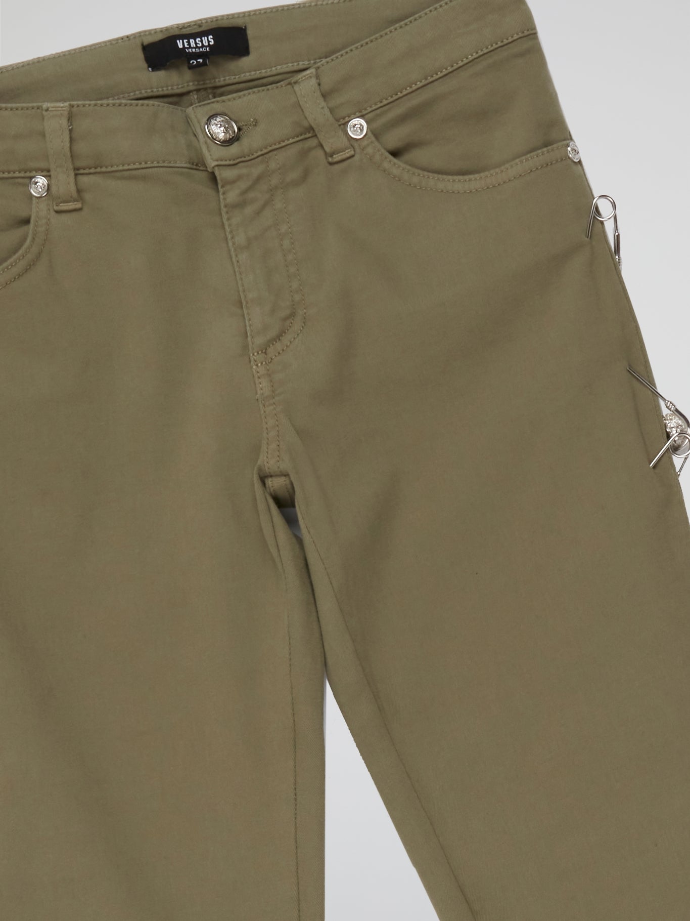 Step into effortless style and timeless elegance with the Olive Straight Cut Pants by Versus Versace. Crafted from luxurious olive green fabric, these pants feature a flattering straight-leg silhouette that elongates the legs and accentuates your curves. Whether paired with a crisp white blouse for a polished office look or a sleek leather jacket for a night out, these pants effortlessly exude sophistication and flair.