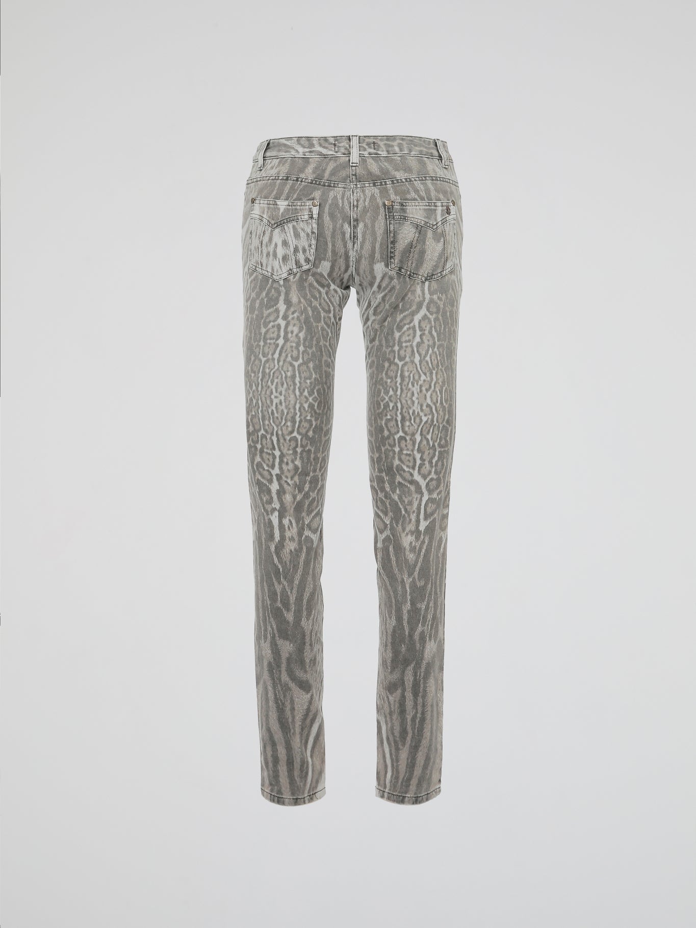 Step into the wild side of fashion with Roberto Cavalli's Animal Print Jeans, a fierce and daring addition to your denim collection. Crafted with impeccable precision, these jeans effortlessly fuse a touch of untamed allure with a classic silhouette. Showcasing the iconic Cavalli style, these statement pieces promise to bring out your inner fashion predator wherever you go.