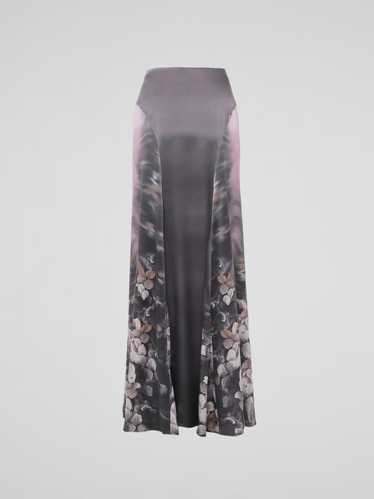 Step into the whimsical world of fashion with the Floral Print Maxi Skirt by Roberto Cavalli. Designed to turn heads and ignite a sense of romanticism, this skirt is a true masterpiece of elegance. With its vibrant floral patterns and flowing silhouette, it effortlessly combines style and grace, making every step feel like a dream-worthy catwalk.