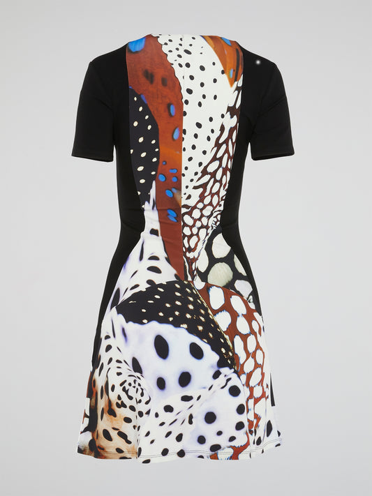 This gorgeous Abstract Print Keyhole Dress by Roberto Cavalli is a stunning addition to any wardrobe. The intricate design and keyhole cutout add a touch of femininity and elegance to this bold piece. You'll turn heads and make a statement wherever you go in this eye-catching dress.