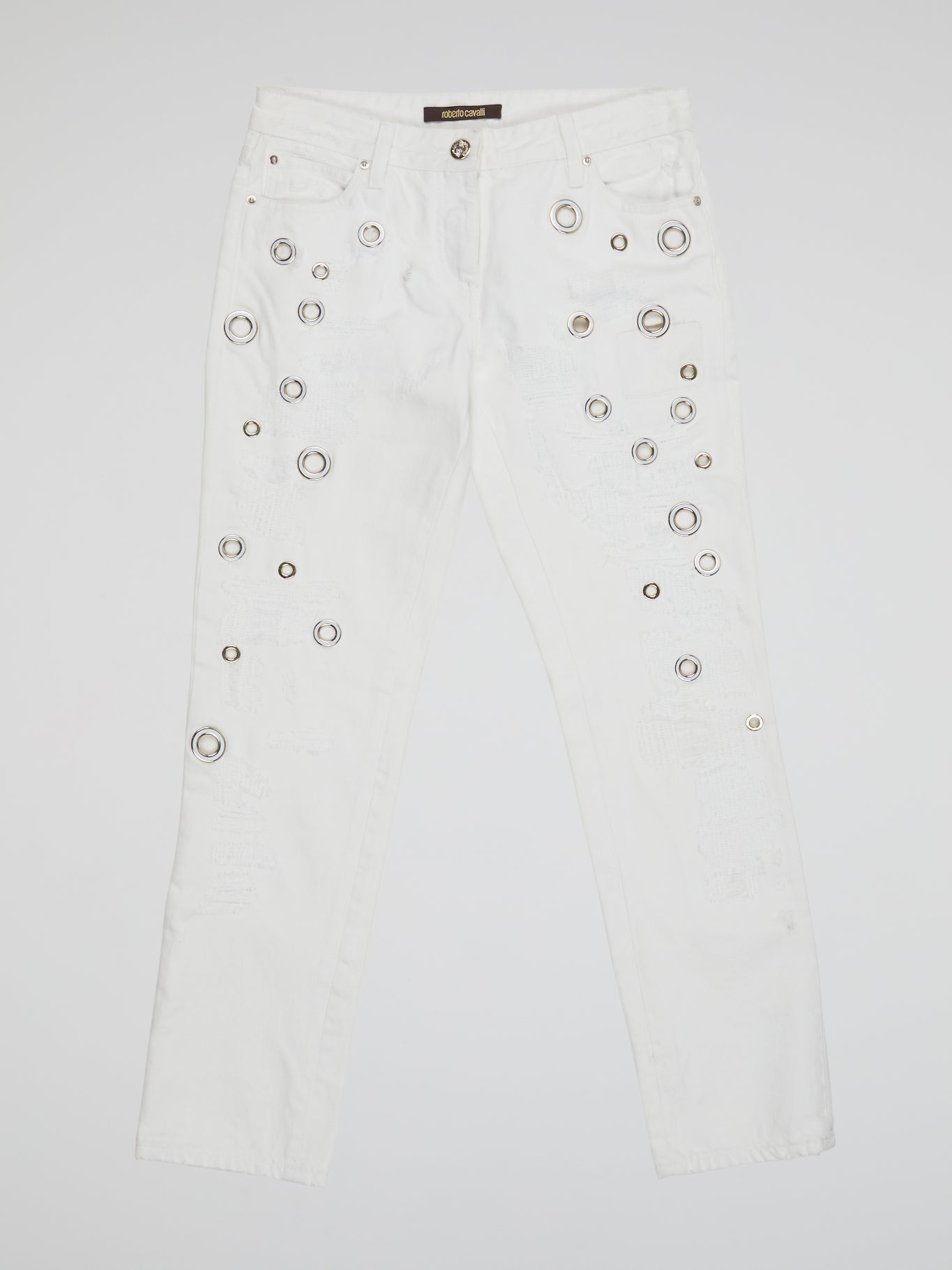 Elevate your denim game with these stunning White Embellished Denim Jeans by Roberto Cavalli. Featuring intricate beadwork and shimmering embellishments, these jeans are truly a work of art. Stand out from the crowd and make a statement with these one-of-a-kind, luxurious jeans.