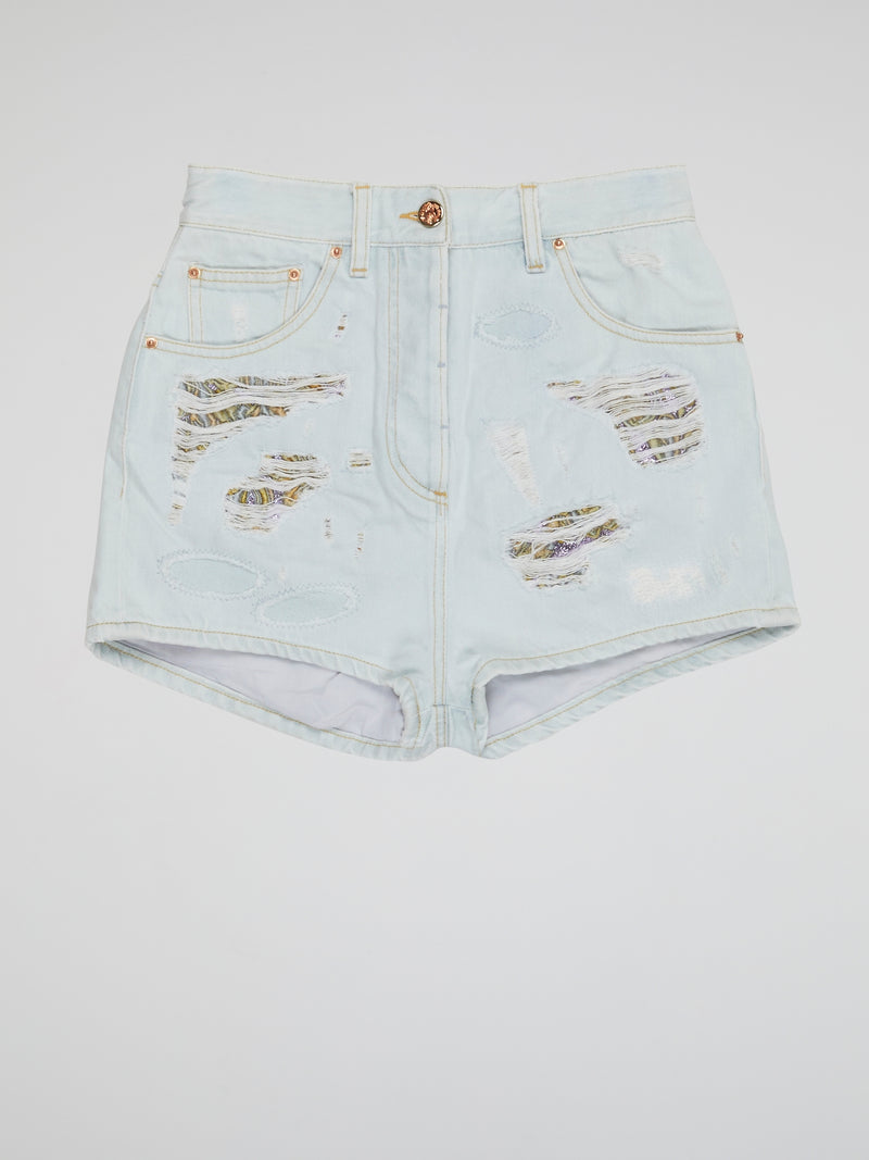 Embrace your inner rebel with our Blue Distressed Denim Shorts by Roberto Cavalli- perfect for any daring fashionista looking to make a statement. With a worn-in look and edgy vibes, these shorts are sure to turn heads wherever you go. From music festivals to beach days, these shorts are a must-have addition to your wardrobe for a bold and fearless style.