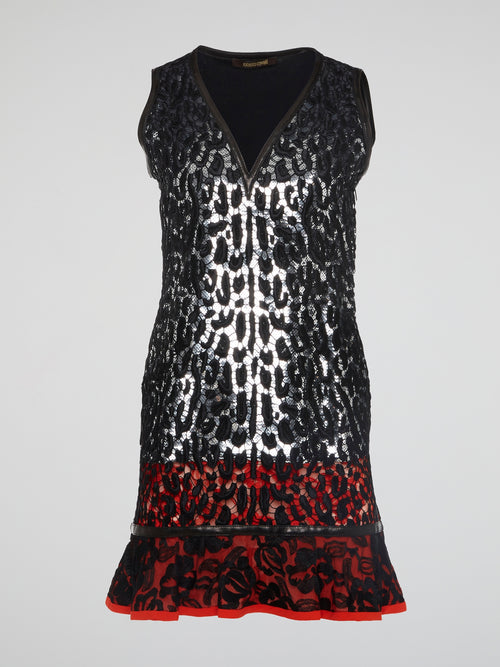 Indulge in the fierce elegance of the Roberto Cavalli Leopard Pattern Lace Overlay Dress. Embrace your wild side with the intricate lace detailing and bold leopard print design. Stand out from the crowd and unleash your inner fashionista with this show-stopping statement piece.