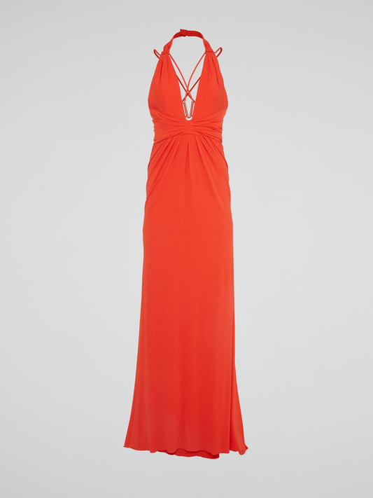 Feel like a bohemian goddess in our stunning red halter neck maxi dress by Roberto Cavalli. This show-stopping piece features intricate detailing and a flowing silhouette that will turn heads wherever you go. Embrace your inner confidence and make a statement in this unforgettable dress that exudes luxury and sophistication.