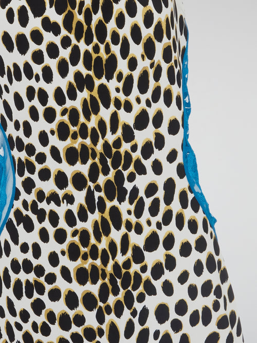 Unleash your inner wild side with our stunning Leopard Print Halter Neck Dress by Roberto Cavalli. This fierce and fabulous piece exudes confidence and sophistication, making it perfect for any special occasion or night out. Stand out from the crowd and turn heads wherever you go in this show-stopping statement dress.