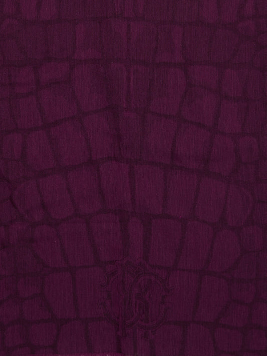 Wrap yourself in luxury with this stunning Burgundy Snake Print Scarf by Roberto Cavalli. Made from the finest materials, this scarf features a bold and captivating design that will elevate any outfit. Stand out from the crowd and exude confidence and style with this must-have accessory.