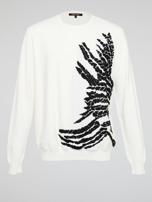 Wrap yourself in pure luxury with this exquisite white embroidered sweatshirt from Roberto Cavalli. The intricate detailing and soft fabric ensure both comfort and style, making it the perfect statement piece for any occasion. Elevate your wardrobe with this timeless and effortlessly chic addition that is sure to turn heads wherever you go.