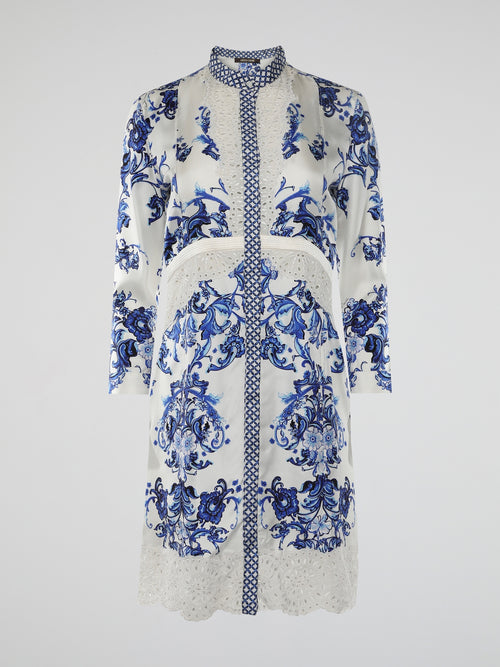 Introducing the epitome of elegance and avant-garde fashion: the Baroque Print Shirt Dress by Roberto Cavalli. This enchanting ensemble combines the timeless charm of baroque aesthetics with a modern twist, exuding confidence and sophistication in every thread. From its meticulously crafted detailing to its flowing silhouette, this dress is a masterpiece that effortlessly turns heads wherever it goes.