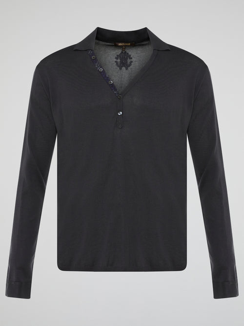 Elevate your style with the timeless elegance of our Black Long Sleeve Polo Shirt by Roberto Cavalli. Crafted with meticulous attention to detail, this wardrobe staple features a luxurious blend of comfort and sophistication. Whether you're headed to a casual brunch or a formal event, this Polo Shirt will effortlessly take you from day to night with its sleek design and iconic Cavalli logo.