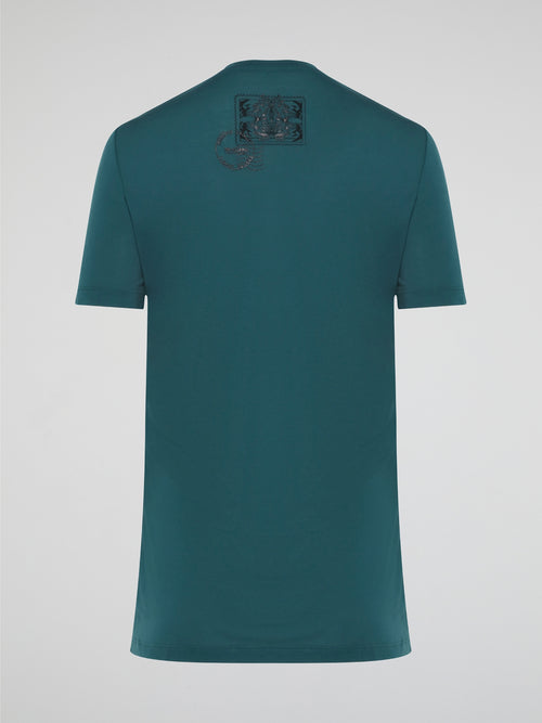 Elevate your casual style with the Green Printed T-Shirt from Roberto Cavalli, featuring a bold and eye-catching design that is sure to turn heads. Crafted from high-quality materials, this shirt offers both comfort and sophistication, making it the perfect addition to any fashion-forward wardrobe. Whether paired with jeans for a laid-back look or dressed up with a blazer for a night out, this t-shirt is a versatile and trendy choice for any occasion.