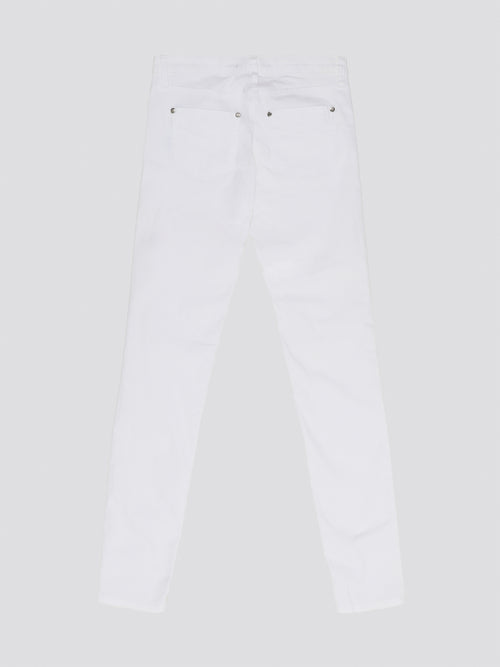 Indulge in timeless elegance and modern sophistication with these White Straight Leg Jeans by Roberto Cavalli. Crafted with precision and attention to detail, these jeans feature a sleek silhouette that effortlessly complements any ensemble. Elevate your everyday wardrobe with a touch of luxury and style with these iconic Roberto Cavalli jeans.