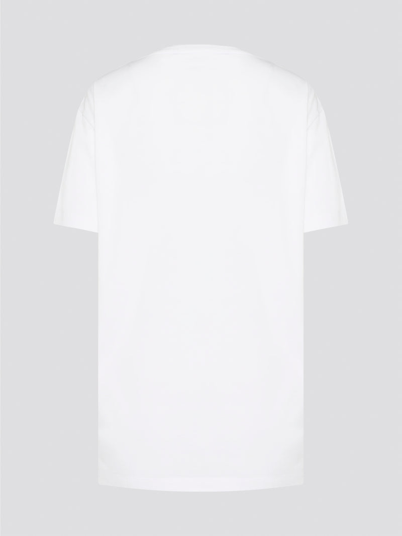 Elevate your casual style with the White Printed Oversized T-Shirt from Roberto Cavalli. Made with premium cotton fabric, this tee features a bold and eye-catching print that will set you apart from the crowd. Whether you dress it up with heels or keep it cool with sneakers, this statement piece is a must-have for your wardrobe.