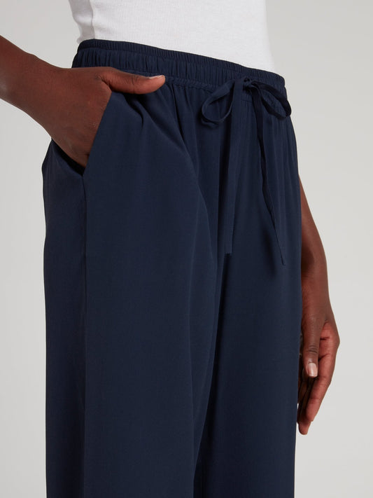 Темно-синие широкие брюки с кружевными вставками