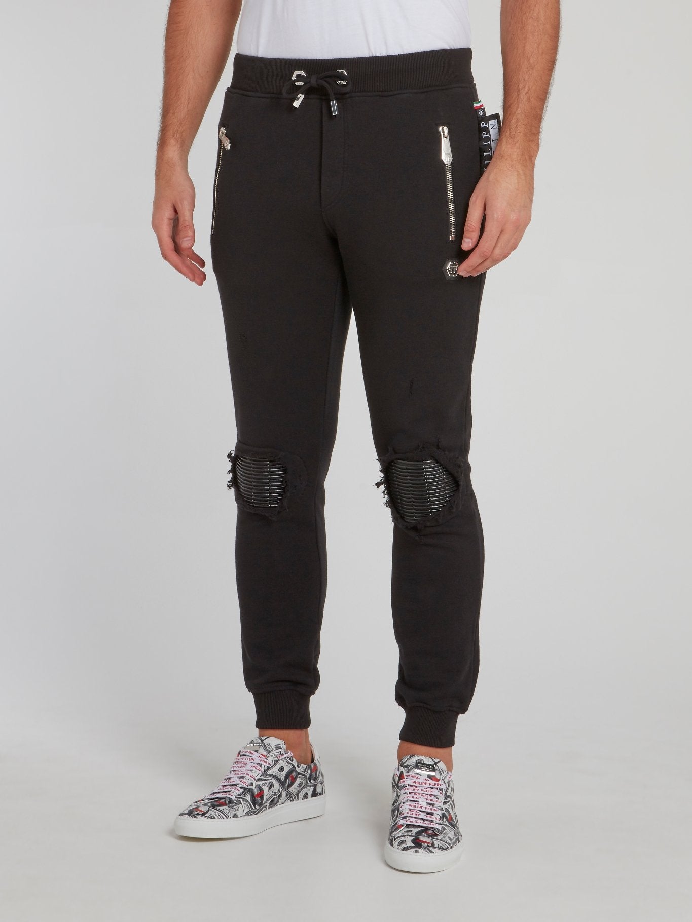 Черные спортивные брюки с рваной отделкой